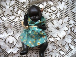 6.5'' CUTIE LITTLE BLACK JOINTED PAINTED BISQUE DOLL, PRINT DRESS